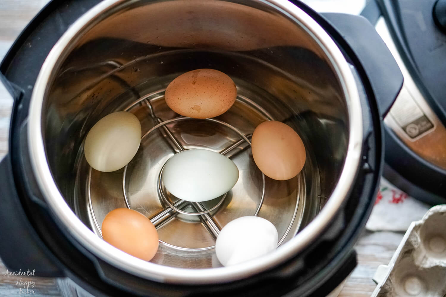 Eggs on a rack inside an instant pot. 
